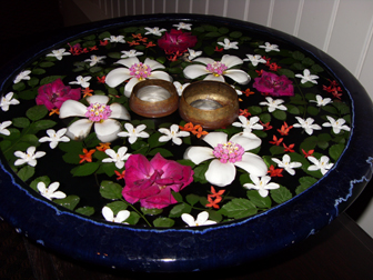 Thai orchids floating in a bowl